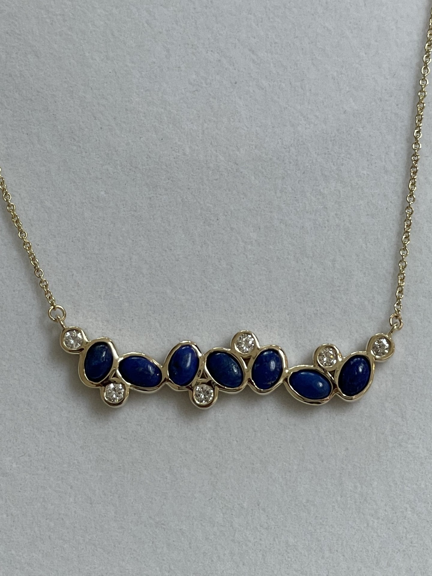 Blue Lapis and diamond pendant necklace