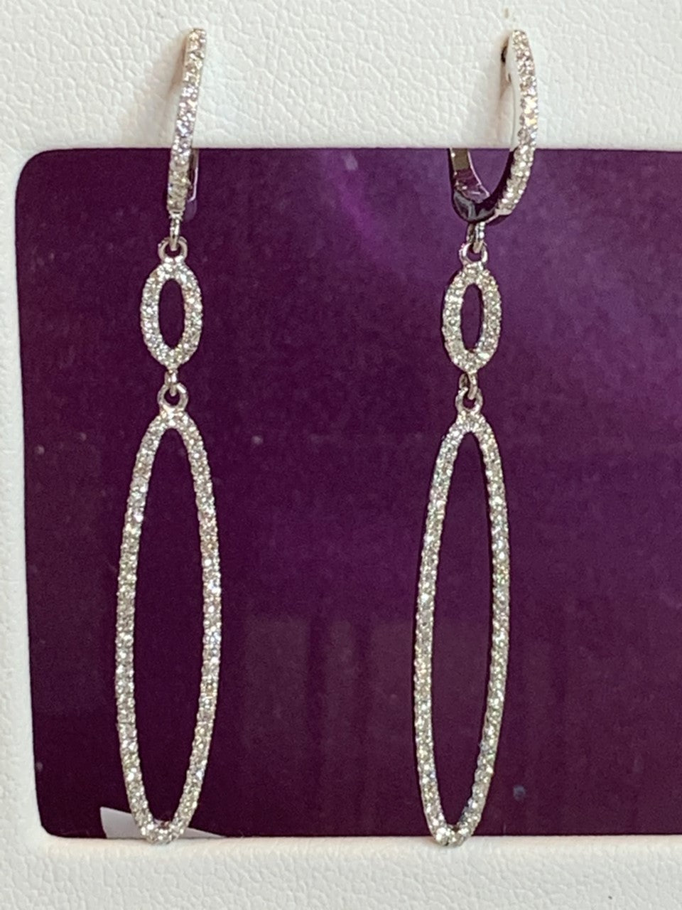 14k white gold oval dangle diamond earrings